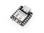 Seeed Studio XIAO ESP32-C3 with pre-soldered headers, angled view