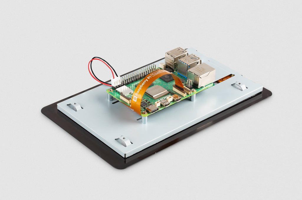 Raspberry Pi Touch Display 2, 7 inch, back with a Raspberry Pi mounted (Pi not included)