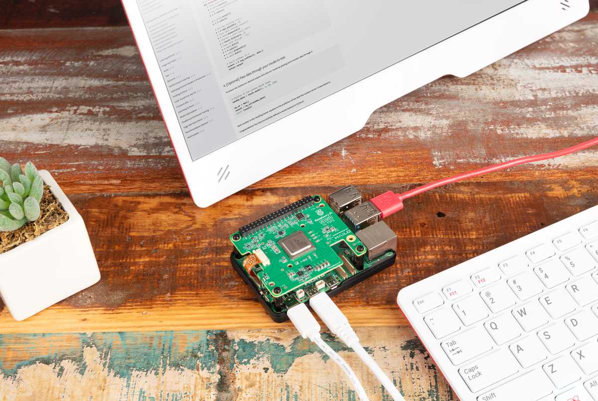 Raspberry Pi AI HAT+ on a Raspberry Pi 5 at a desk